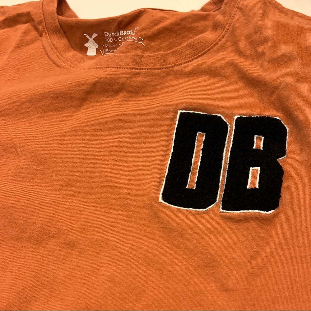 Dutch Bros men’s large shirt with varsity “DB”
lettering